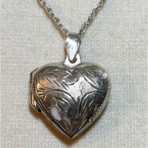 Vintage gorgeous sterling silver  locket. Chain length 9”. Mother’s Day